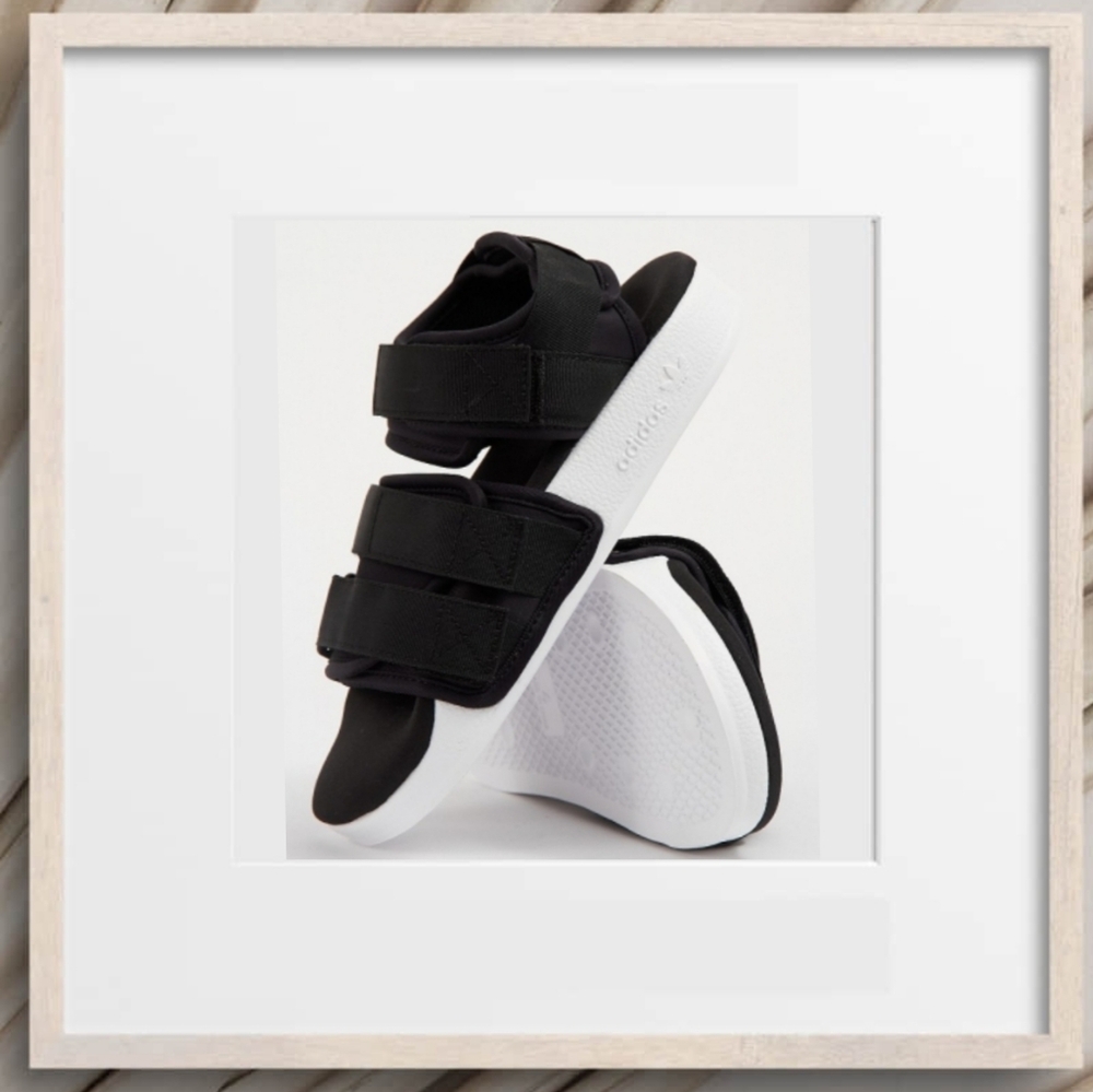 Adidas Adilette Sandal Shoe in classic black with a white sole